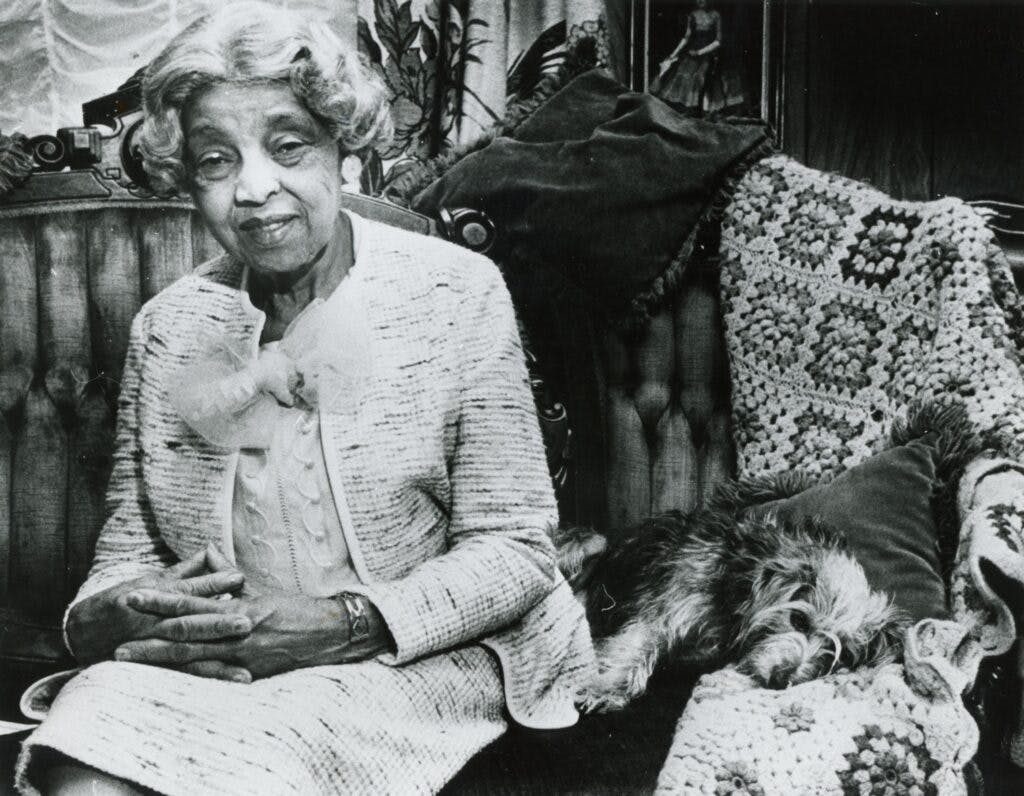 Virginia Y. Lee with her dog, Ginger.