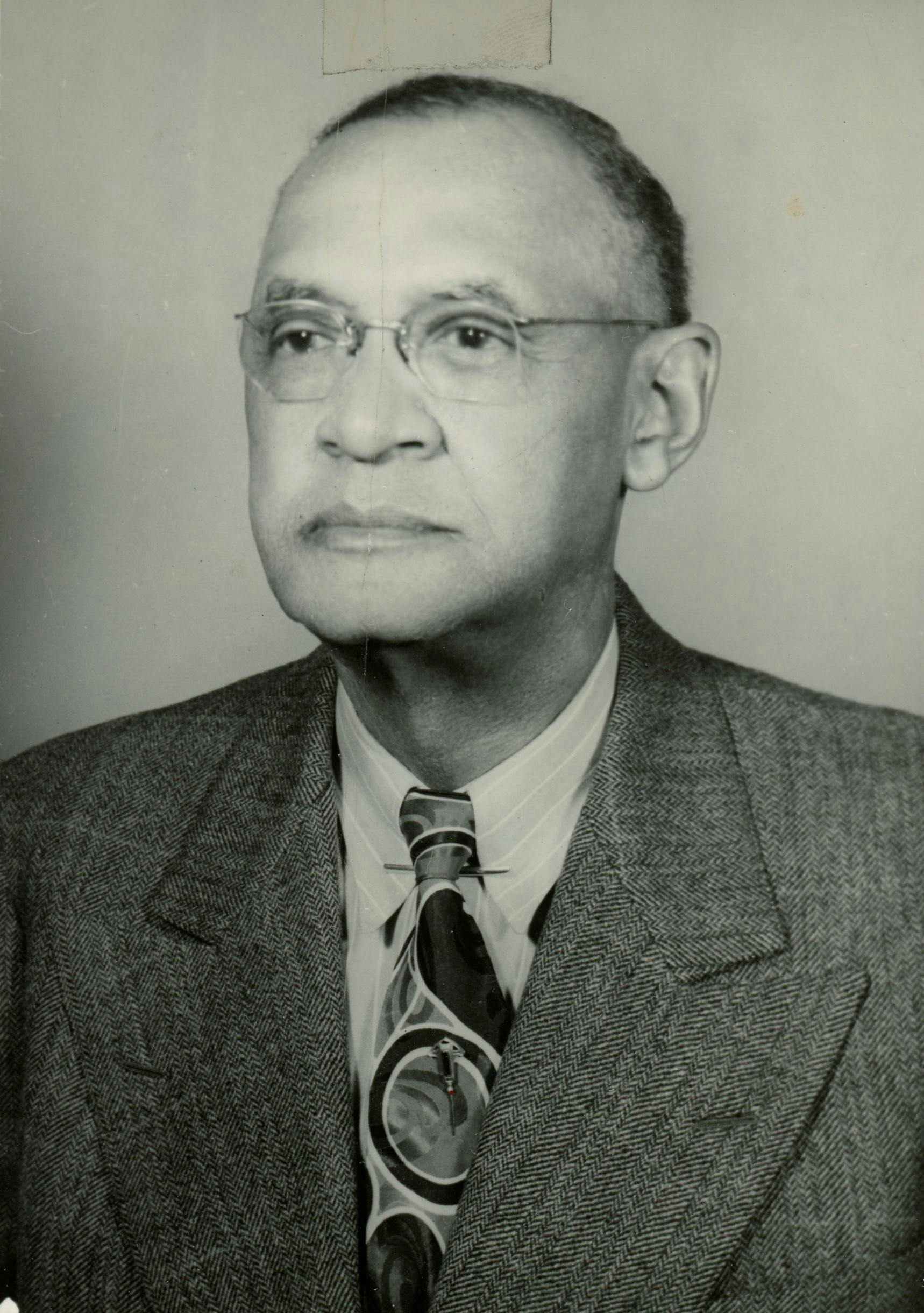 Posed photo of Dr. Roberts in a suit